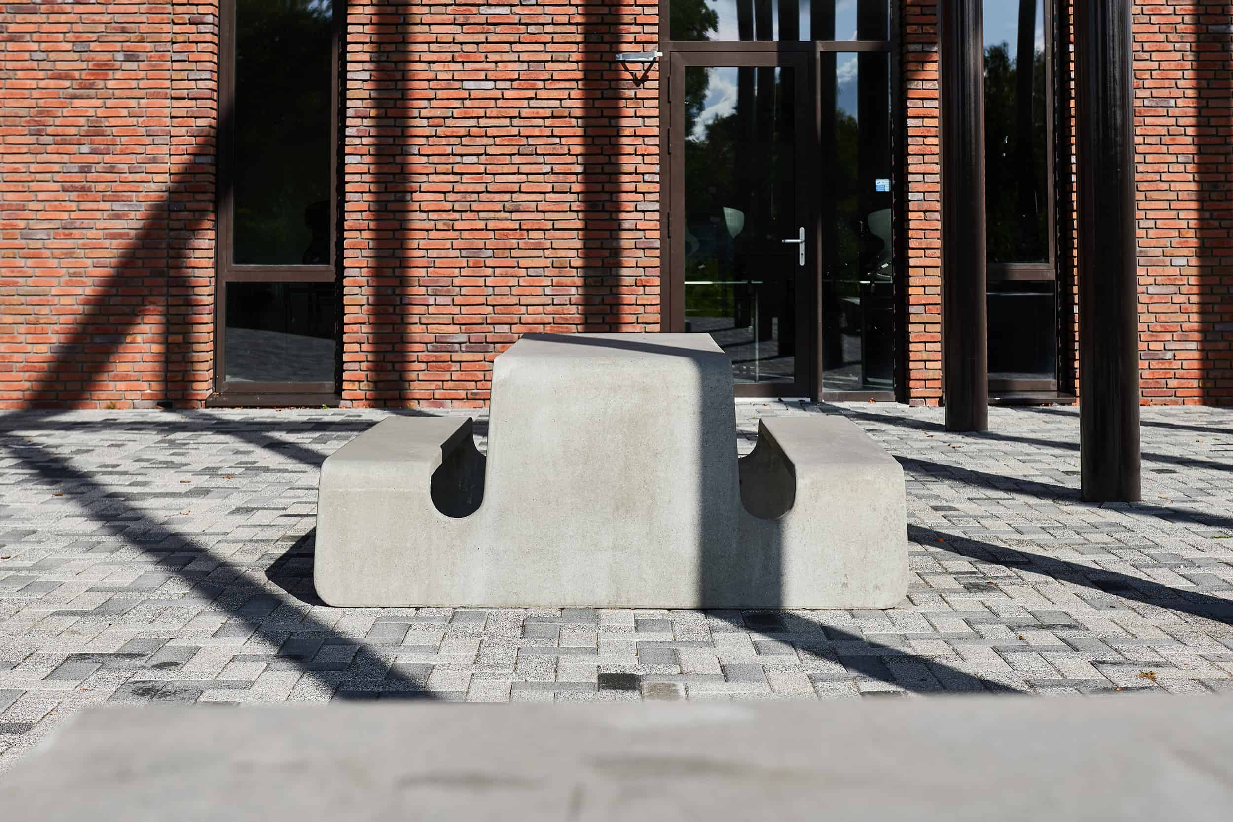 Table with benches in one piece. Designed by CrousCalogero