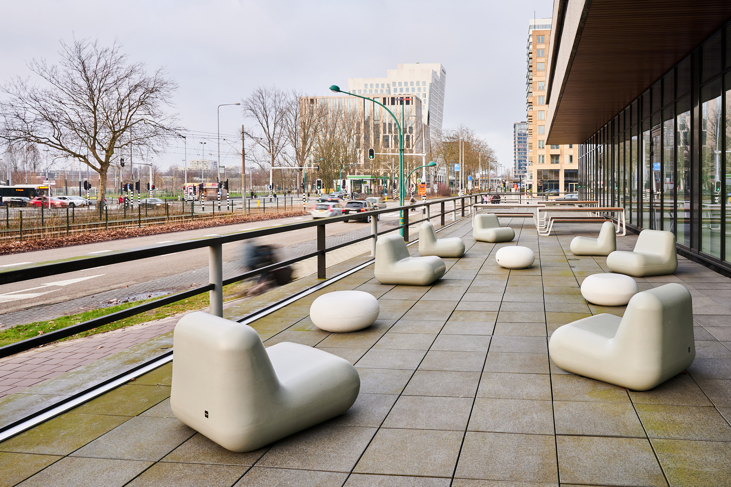 Zuidas overview with citizens passing a public terrace with Durbanis recycled seats