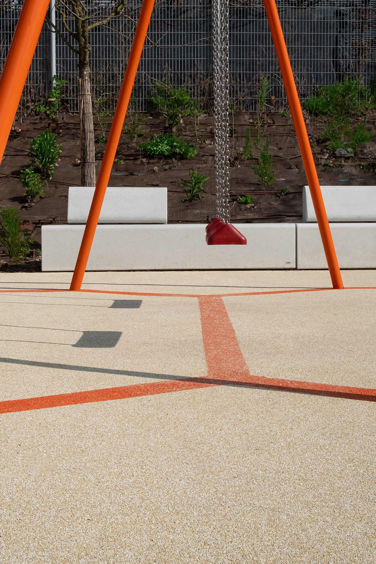 Childrens playground in Asnieres sur Seine in Paris with concrete benches by Durbanis