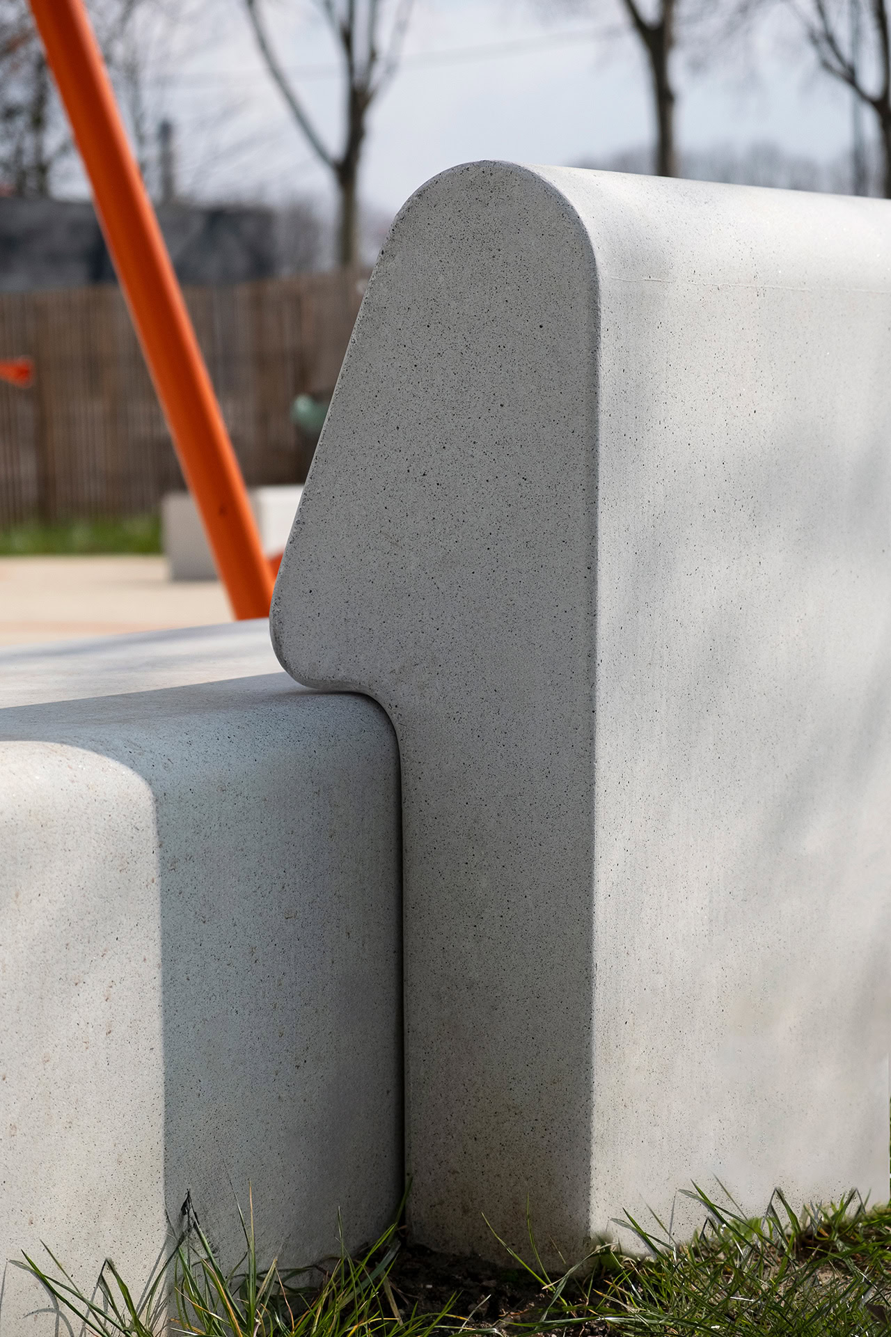 Urban park with concrete benches and backrest by Durbanis