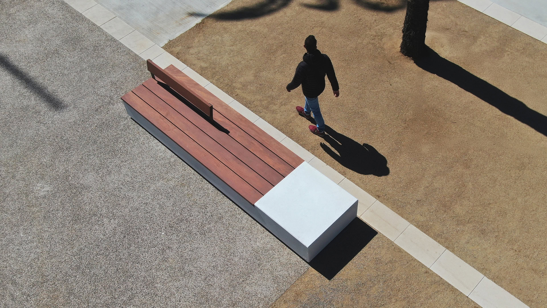 Four-meter bench made of prefabricated concrete and wooden seat