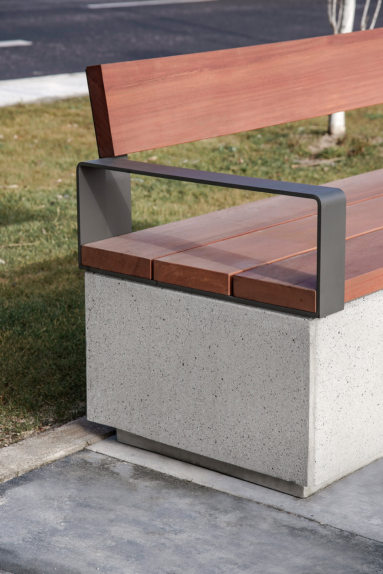 Precast concrete bench with steel armrests and certified wood seat